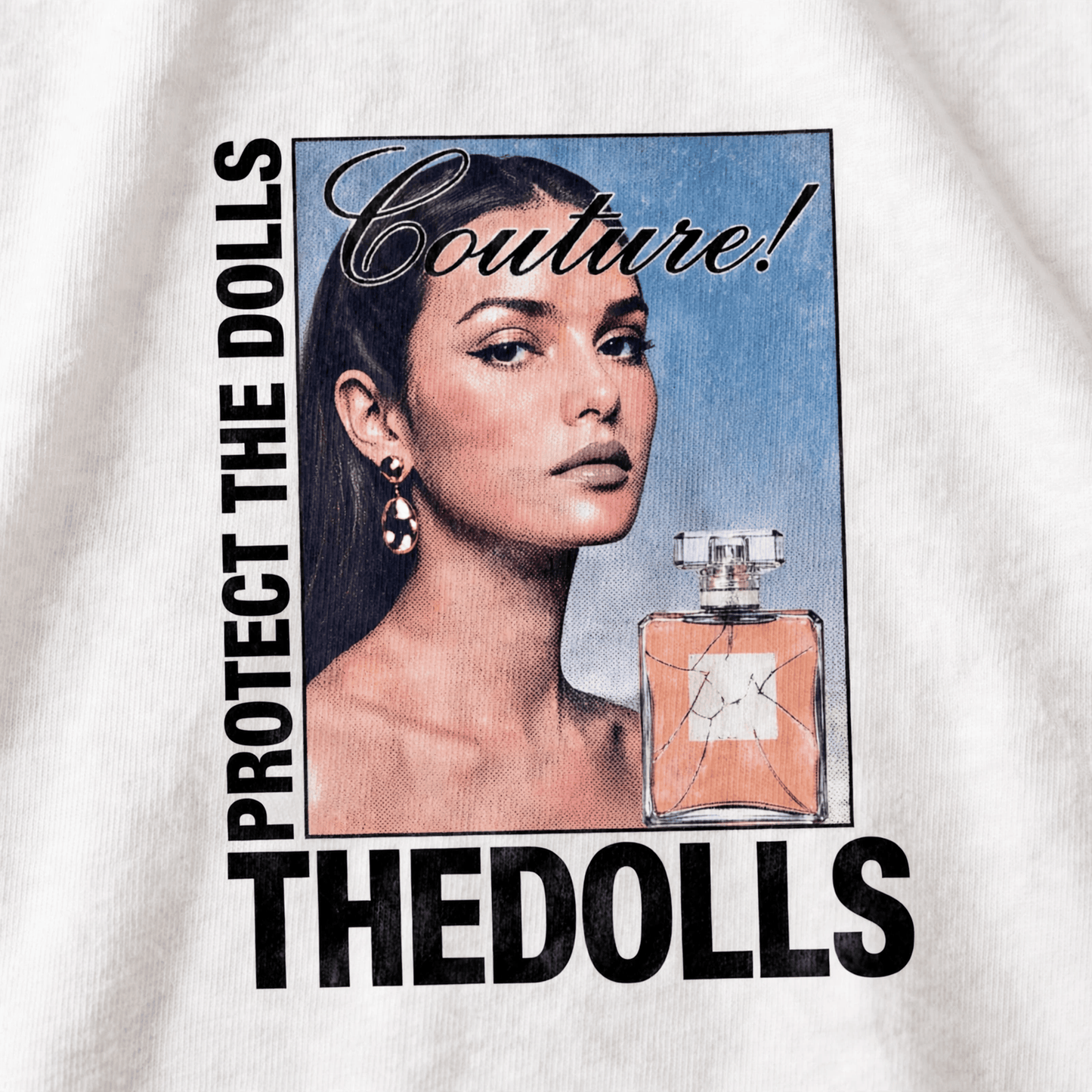 Dollisimo "SIS YOU ARE STILL A DOLL" shirt featuring a detailed macro print design on a white fabric T-shirt.